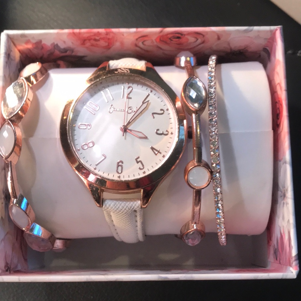 Rose gold watch and bracelets